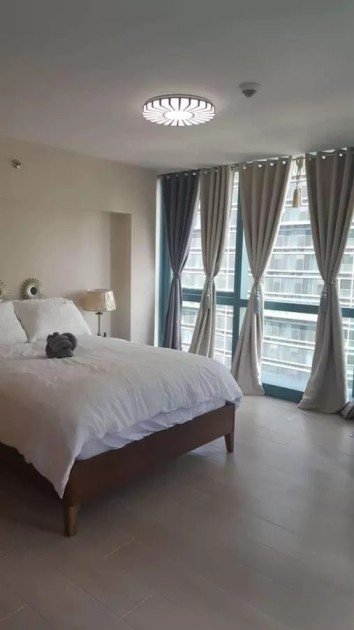 Condo For Sale 1BR w/ Parking at One Uptown Residences in Fort Bonifacio, Taguig